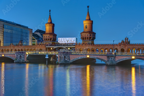 The Oberbaumbridge and the river Spree in Berlin at night