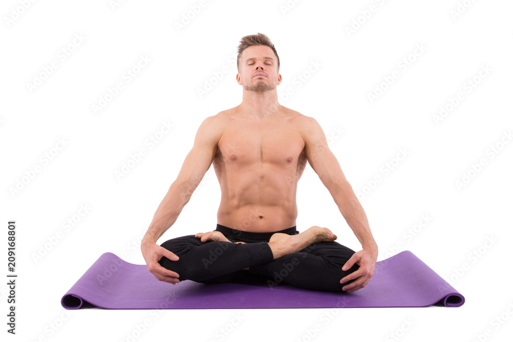 Yoga and relaxation. Pose of the lotus. Attractive man. Yoga and relaxation. Pose of the lotus. Attractive man.