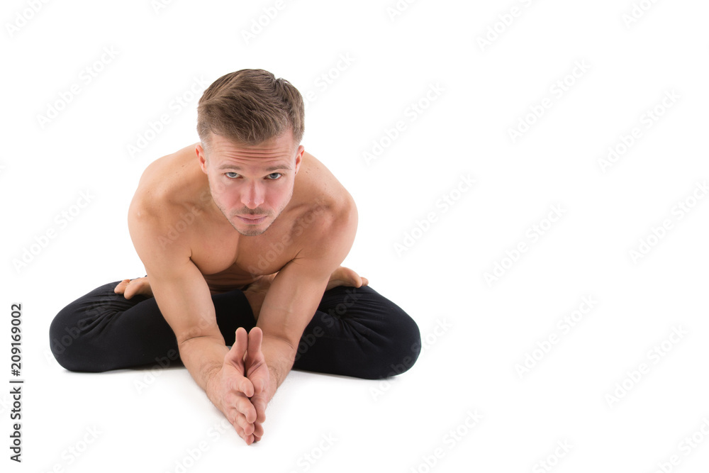 Yoga and relaxation. Attractive man. White background. Yoga and relaxation. Attractive man. White background.