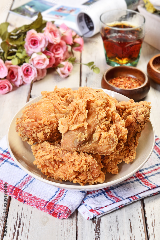 Crispy fried chicken on wooden table Crispy fried chicken on wooden table