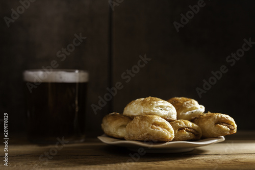 salty puff pastry plate and beer