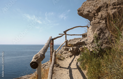 Mountain path  fenced from the sea  for walks. Crimea.