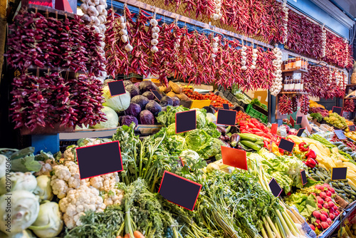 Photography Counter filled with various vegetables and famous hungarian paprika in the great