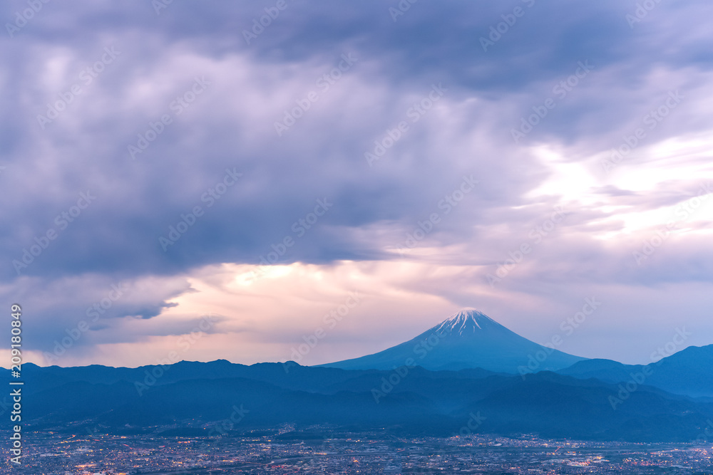 Mountain Fuji with rain cloudy in early morning