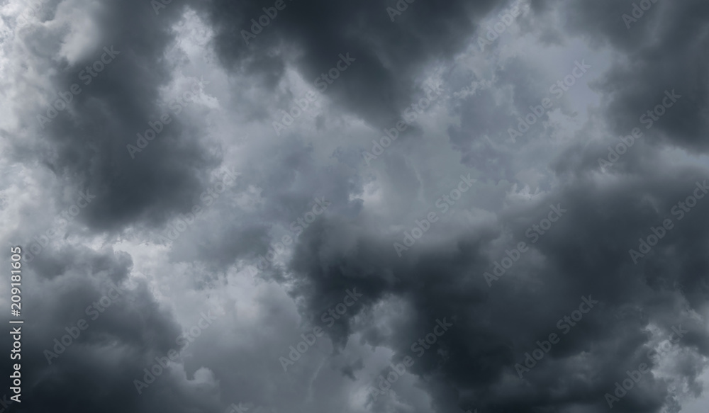 Dark storm clouds before rain used for climate background. Clouds become dark gray before raining. Dramatic background. Dark storm clouds before rain used for climate background. Clouds become dark gray before raining. Dramatic background.