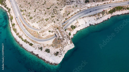 Aerial drone bird s eye view photo of Tunnel in Athens riviera seaside road known as hole of Karamanlis  Attica  Greece