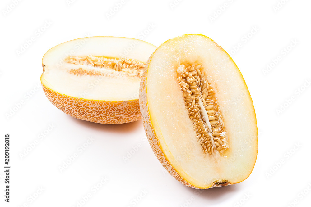 Half honeydew melon tropical fruit isolated on a white background. Half honeydew melon tropical fruit isolated on a white background.