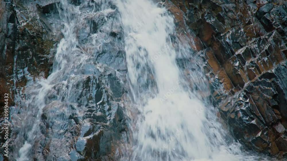 Tilt Down Camera Waterfall Strong Flowing and Splash Through Rock Nook to Pond Tilt Down Camera Waterfall Strong Flowing and Splash Through Rock Nook to Pond
