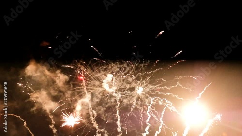 Colorful fireworks at holiday night. 4K video of salutes.
