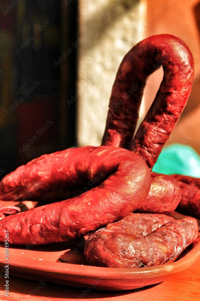 Fototapeta premium Spicy pork sausage for sale at a market stall