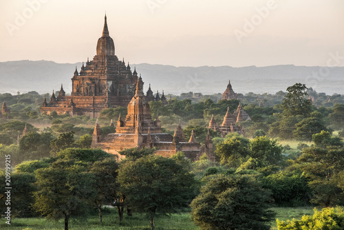Myanmar, Mandalay area, Bagan archaeological site, view from the temple Pyathat Gyi at sunset photo