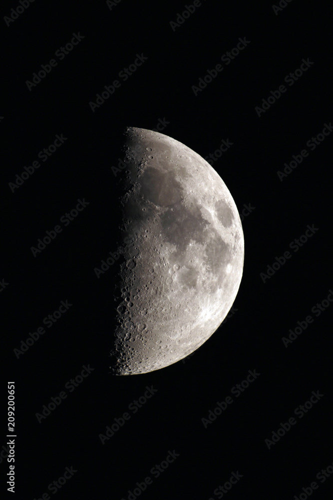 The Massif Central. Cantal. Plateau Trizac. Close up of a first quarter moon. The Massif Central. Cantal. Plateau Trizac. Close up of a first quarter moon.