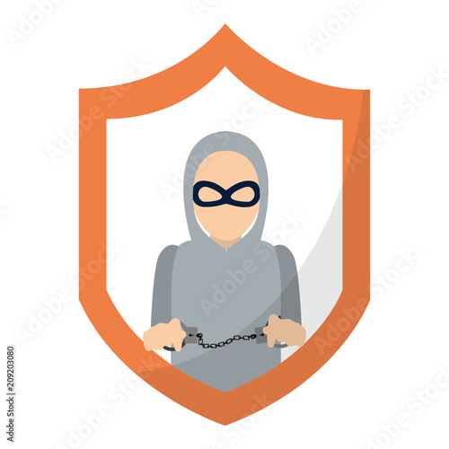 shield with thief mask and criminal handcuffs