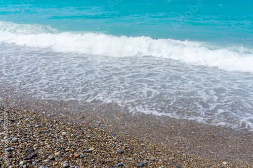 Wave of the sea on the sand beach