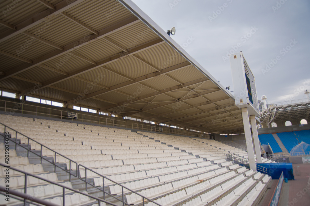 stadium with a podium for a game of football, football stadium