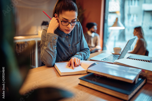 Looking over her study material