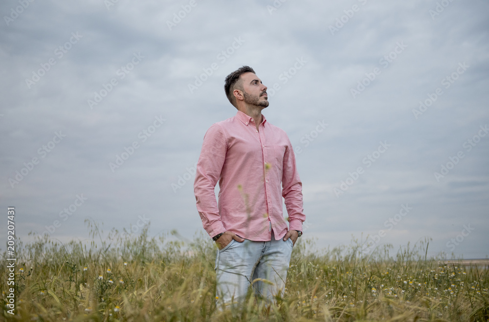 Male model posing in the park