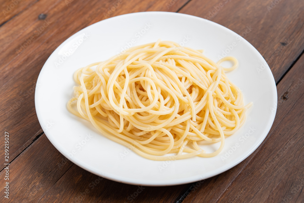 Pasta on wooden background Pasta on wooden background