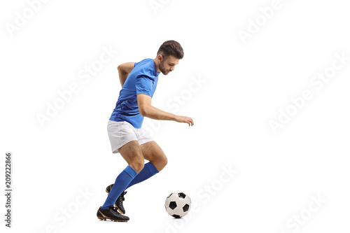 Fotografia Soccer player dribbling
