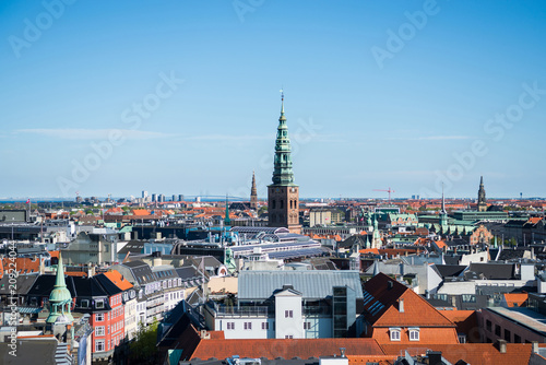 cityscape of Copenhagen with spire of City Hall  Denmark