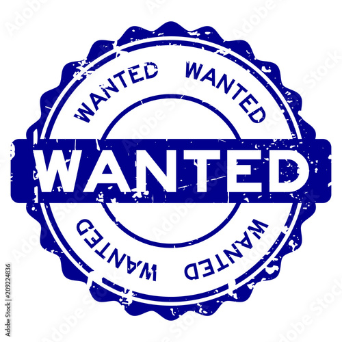 Grunge blue wanted round rubber seal stamp on white background
