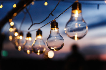 Little yellow lamps shine in the darkness
