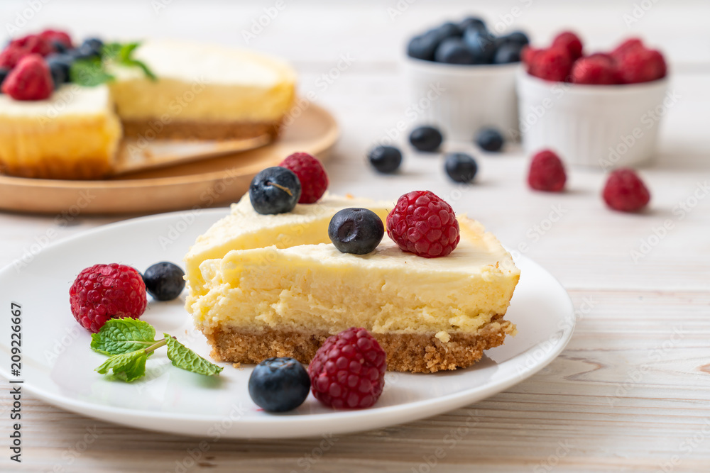 Homemade cheesecake with raspberries and blueberries Homemade cheesecake with raspberries and blueberries
