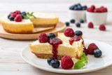 Homemade cheesecake with raspberries and blueberries