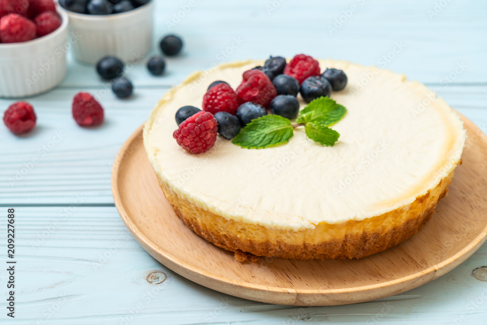 Homemade cheesecake with raspberries and blueberries