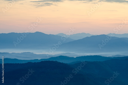 Great overcast over mountain. View from top of the mountain. Fog sea under foot. © NIPATHORN