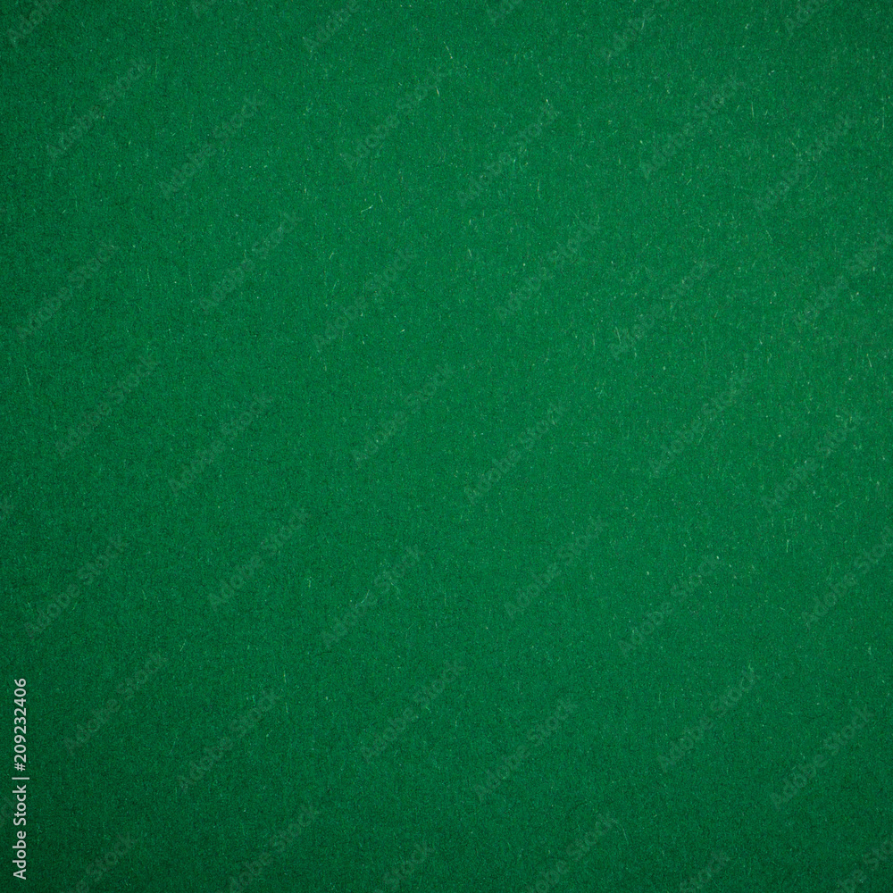 Poker table felt background in green color Photos | Adobe Stock