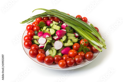 bowl of vegetables isolated on white photo