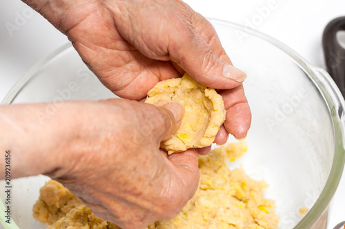 Preparation of plantain croquettes stuffed with pork cracklings photo