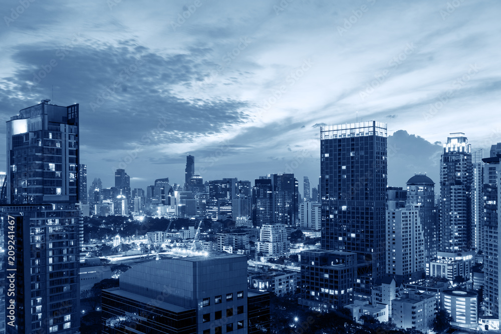metropolis cityscape in dark blue tone color filter