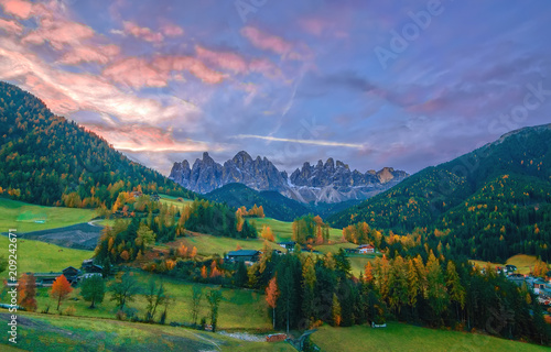 Colorful autumn scenery in Santa Maddalena village at sunrise. Dolomite Alps, South Tyrol, Italy.