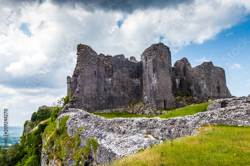 Ruins of an ancient medieval castle on a hillside  Carreg Cennen  Wales  UK 