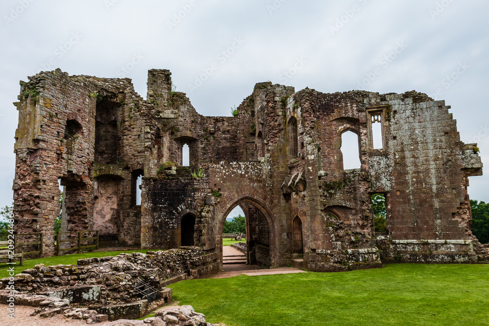 Walls and towers of a ruined ancient medieval castle (Raglan Castle)