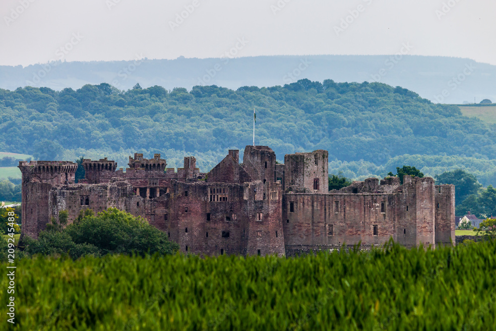 Distance view of the ruins of Raglan Castle in Mouthmouthshire, South Wales