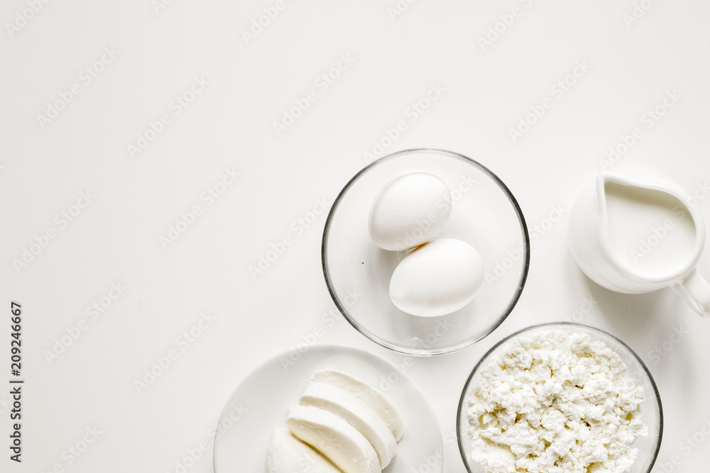 Healthy food concept with milk on white table top view mock-up Healthy food concept with milk on white table top view mock-up
