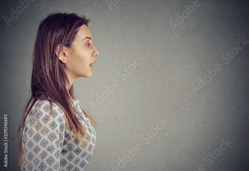profile of a woman with open mouth