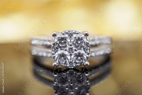 Luxury gold Jewelry diamond rings with reflection on black background