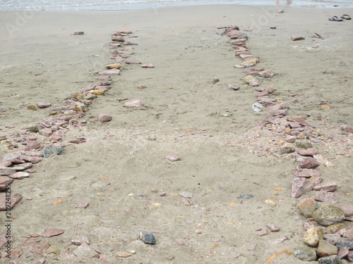 Path of stones on the sand