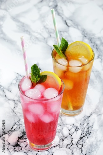 Iced lemonade isolated. Assortment of cold coctails in the glass