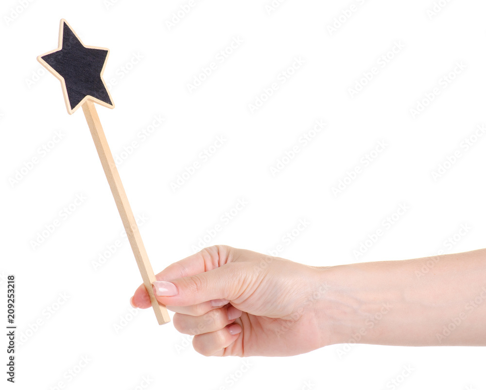 Wooden star on stick decor on white background isolation Wooden star on stick decor on white background isolation