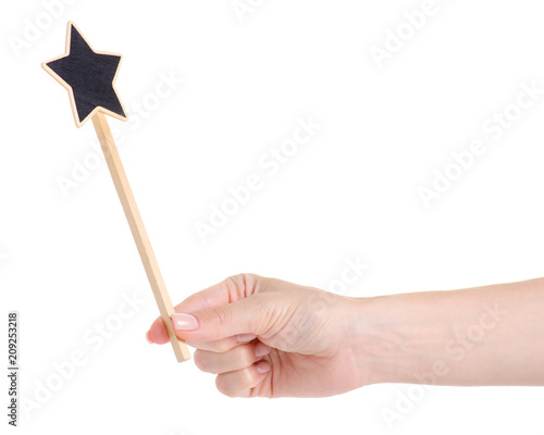 Wooden star on stick decor on white background isolation