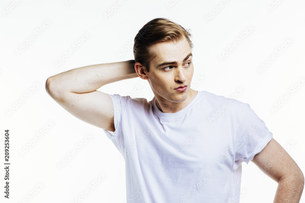 Portrait of a young expressive man on white studio background Portrait of a young expressive man on white studio background