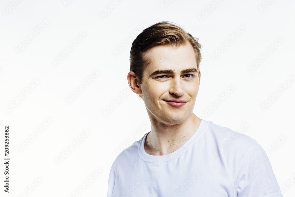 Portrait of a young expressive man on white studio background Portrait of a young expressive man on white studio background