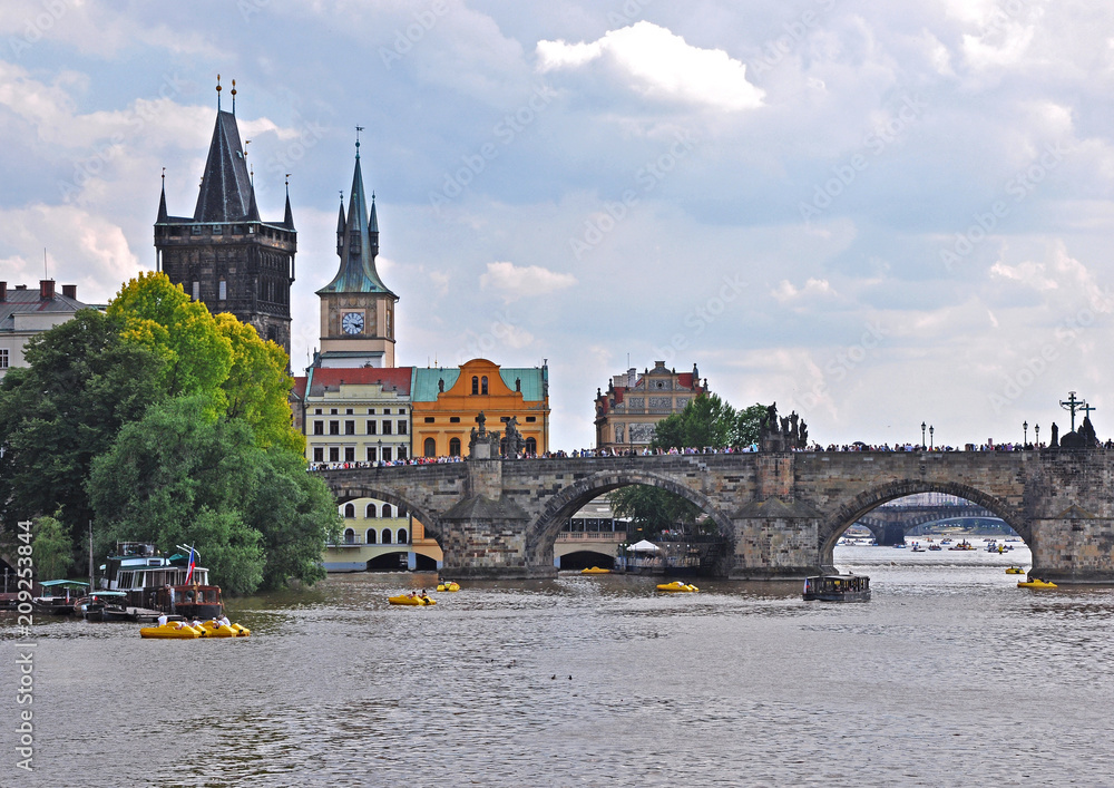 View from the surface of the Vltava River to the historical Gothic Charles Bridge - Prague, Czech Republic. UNESCO.