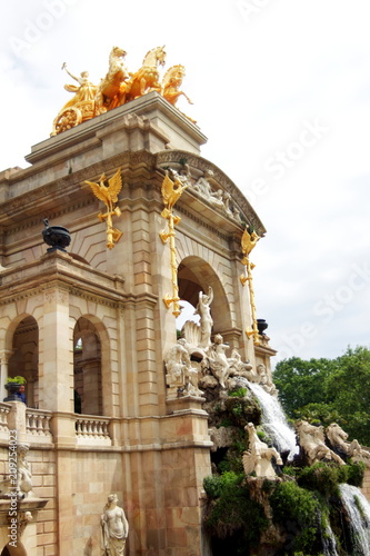 The Cascada Monumental fountain with gold sculpture of Aurora on top in Parc de la Ciutadella in Barcelona, Spain.