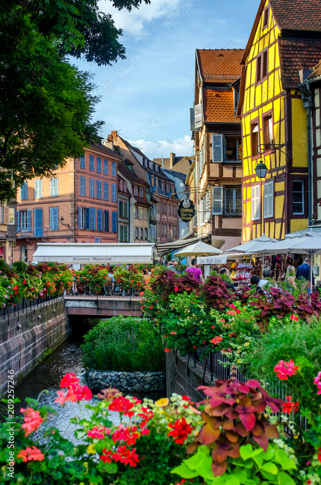 Wonderful Colmar city center with flowers and river, France